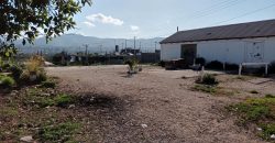 Terreno de 2,7 Ha con 2 casa y 2 bodegas