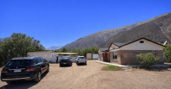Parcela 6.438 m² La Campana Valle de Elqui, con luz y agua, construcción de ladrillo, piscina y frutales.