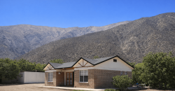 Parcela 6.438 m² La Campana Valle de Elqui, con luz y agua, construcción de ladrillo, piscina y frutales.
